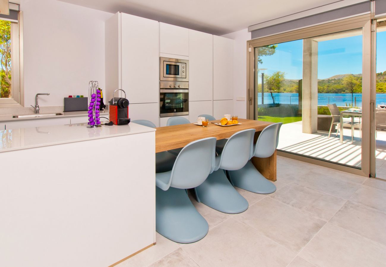 There is a large modern kitchen with dining area - there is also a breathtaking sea view.