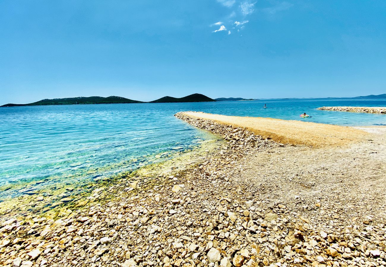 Directly from the holiday home you have a wonderful view of the baby blue sea, where you can cool off.