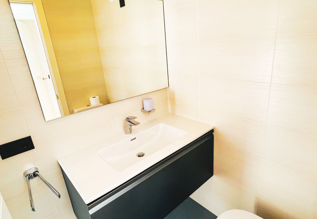 This is the large modern bathroom, which is well equipped.