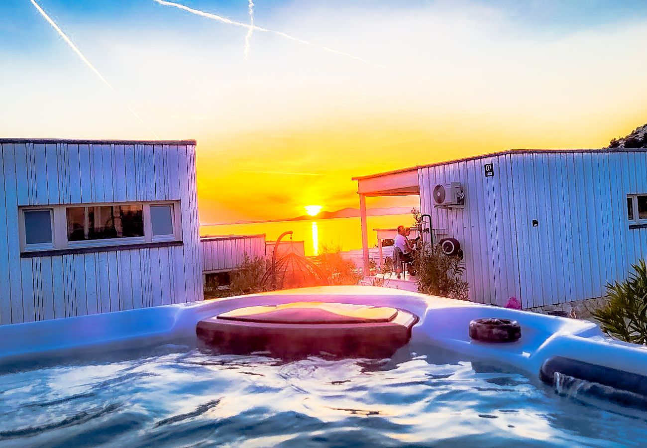 While staying in the whirlpool you can comfortably enjoy the sunset at the sea.