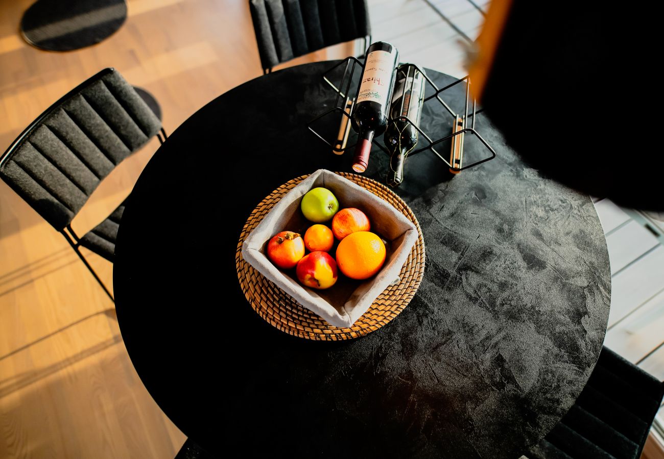 This is the modern dining table that is inside the house. Here you can store your fruit and wine. A perfect combo?