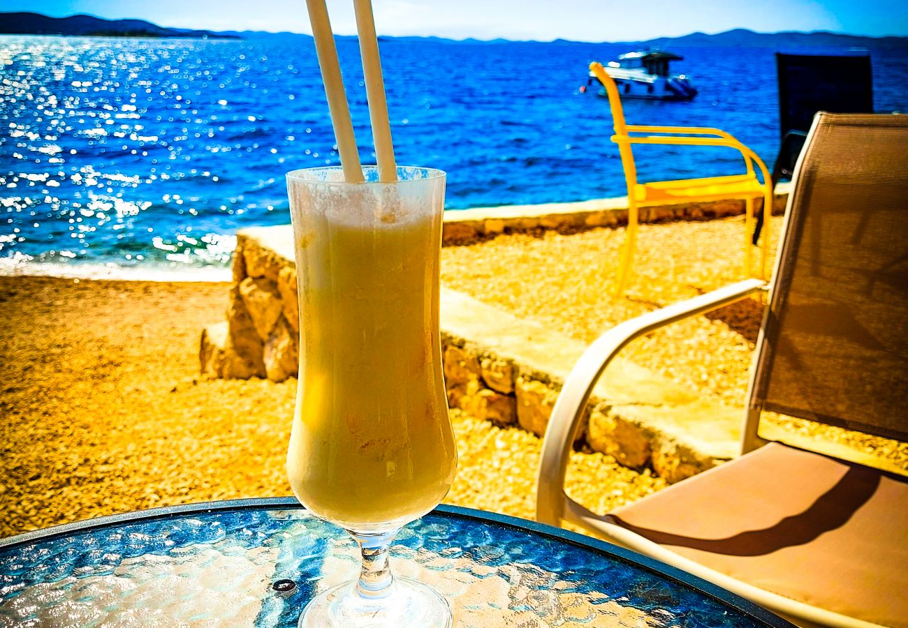 At the holiday home there is a beach bar right by the sea, where you can get the best drinks.