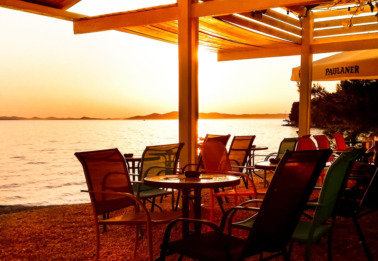 On the seafront is the bar where you can enjoy your drink at sunset.