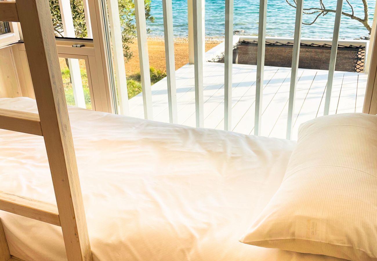 Even from the bunk beds in the children's bedroom you have a great view of the sea.