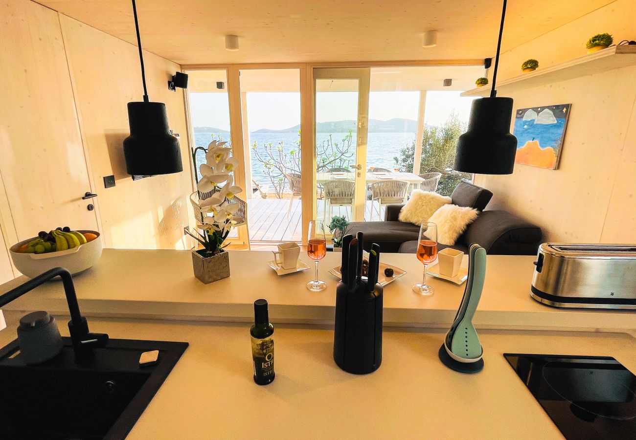 From the modern kitchen you have an incredible view of the great sea.