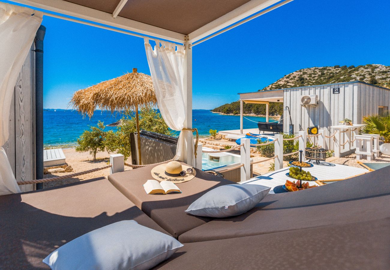 View of the hustle and bustle of the sea from the sunbed on the terrace.