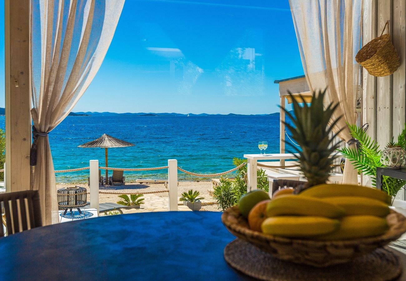 View of the deep blue sea from the villa's dining table